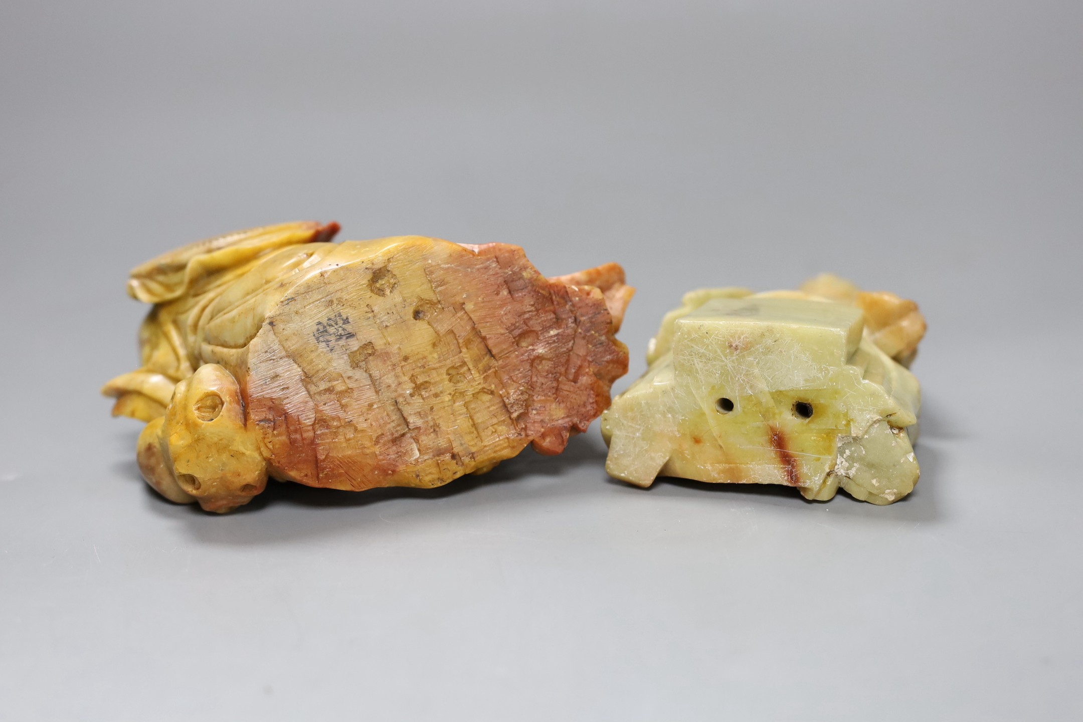 Two Chinese soapstone figures one wood stand,, widest 13 cms
